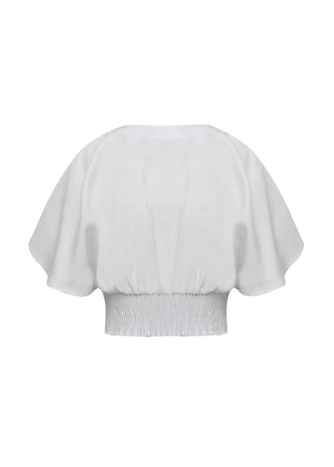 Blusa corta con mangas de campana