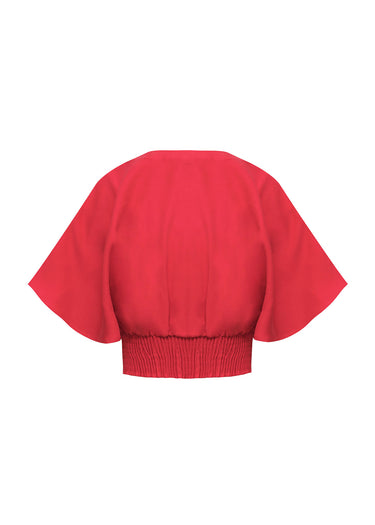 Blusa corta con mangas de campana